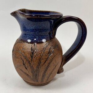 Tom Briney Stoneware Pottery Creamer Pitcher Etched Wheat Blue Brown Handle 12oz